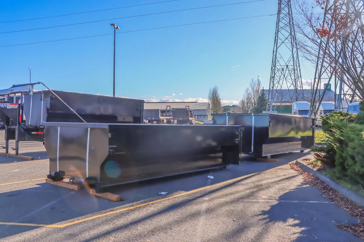 Roll-off dumpster ready for waste disposal at job site for 2 Yard Dumpster Rental in Elizabeth
